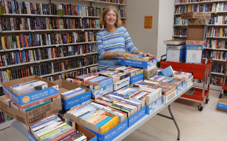 Love of Books, Reading, and the Library Keeps Friends’ Volunteers Coming Back